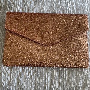 Rose gold sequin clutch